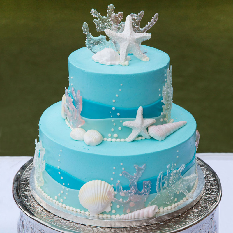 Голубой свадебный торт в морской тематике