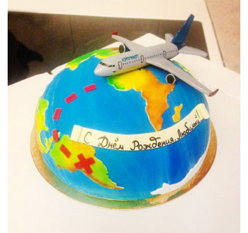 Торт с самолетом над Землей