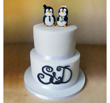 Двухъярусный торт с пингвинами